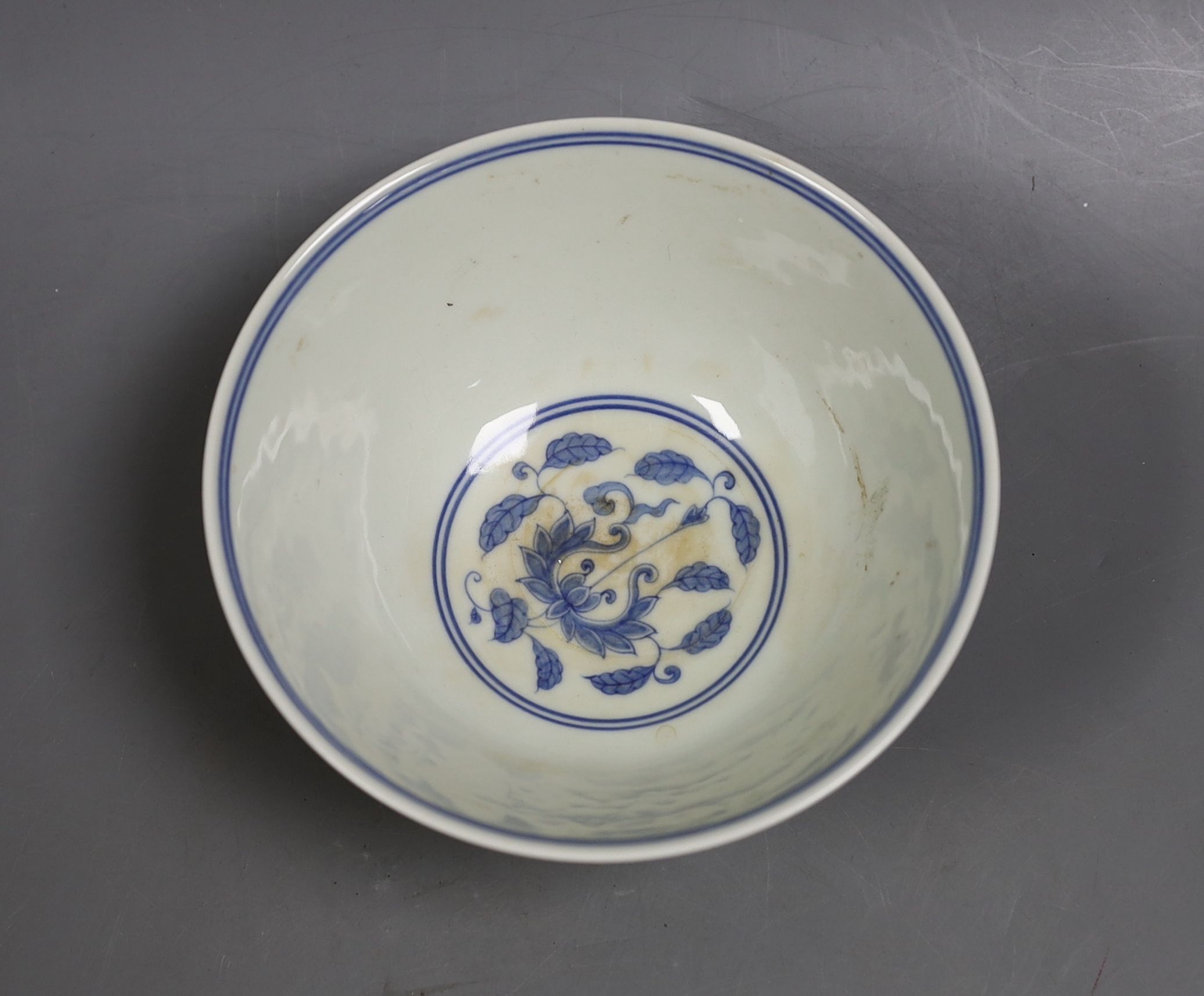 A Chinese blue and white bowl, 14 cms diameter.